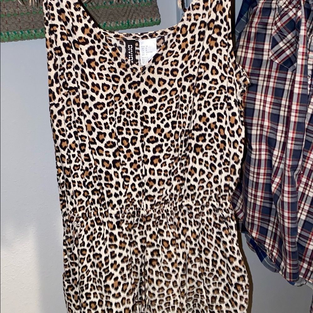 Leopard romper size 8